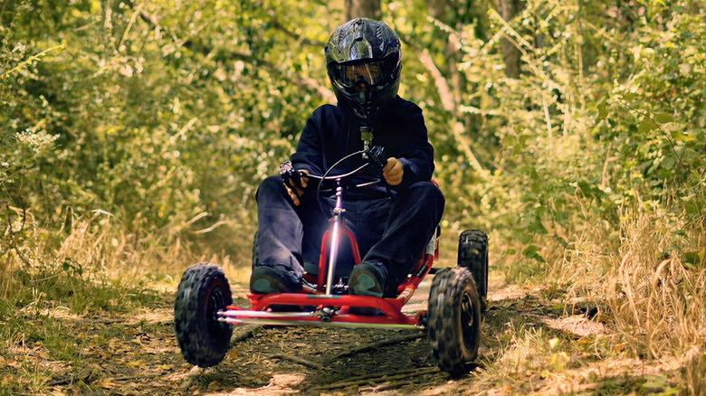 On a woodland trail with a Massimo GKS 200 kart