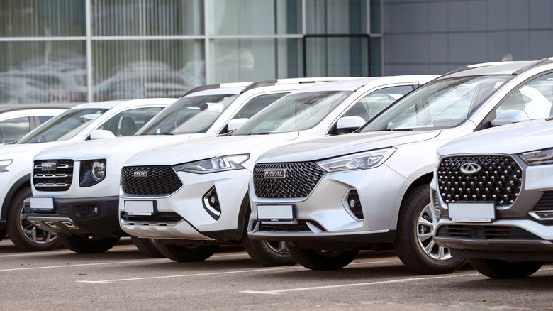 Imported Chinese cars parked outside a showroom in Europe