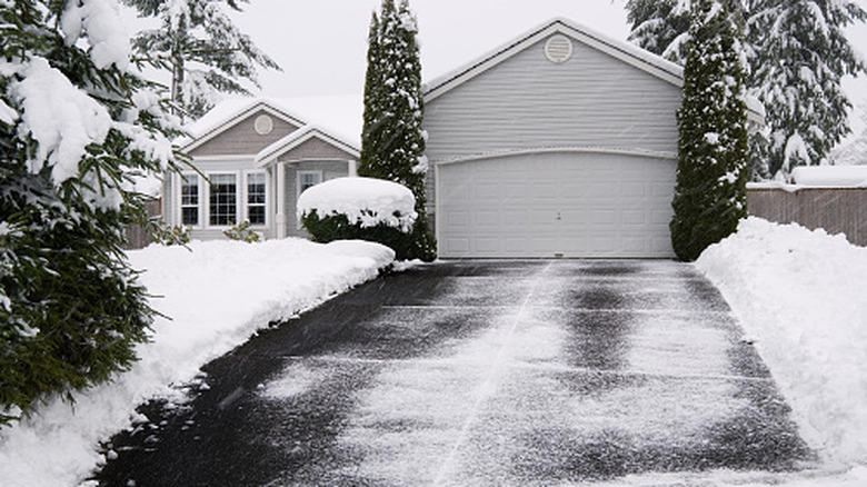 Shoveled residential driveway in winter