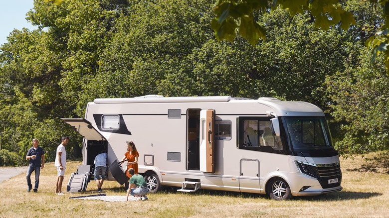 Group of people outside of RV