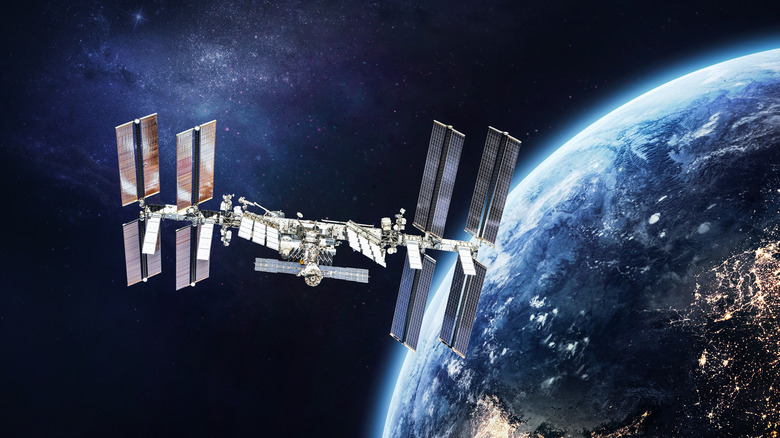 An artist's impression of the International Space Station orbiting the earth.