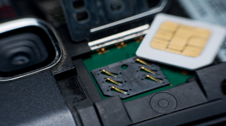 Close up of a Sim card slot in a retro phone