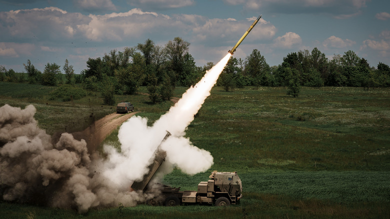 A M142 HIMARS launches a rocket on the battlefield