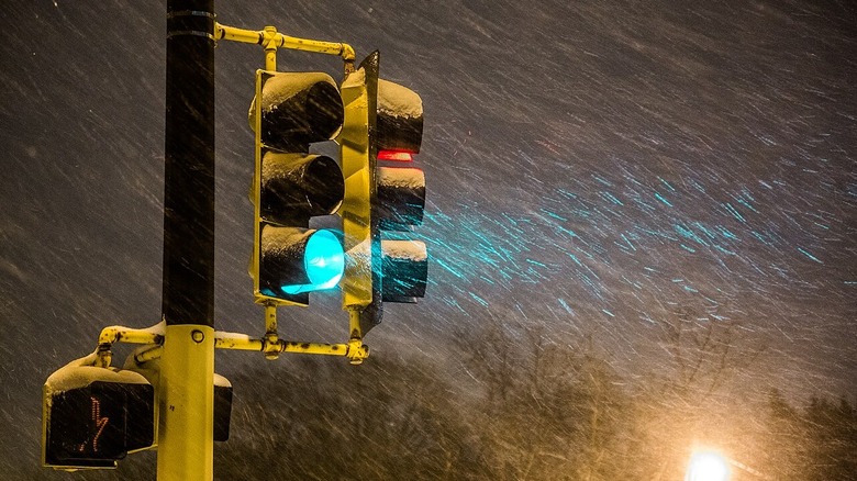 Traffic light with a version of the snow scoop visor in  Minneapolis, Minnesota.