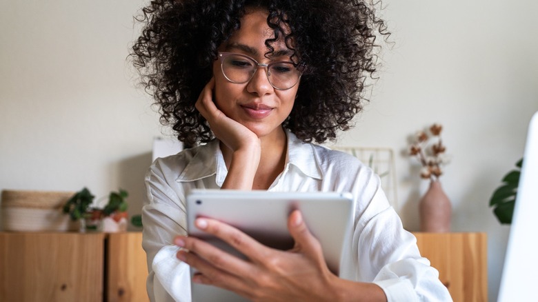Woman looking at a tablet device