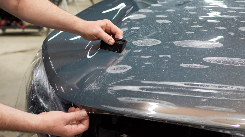 clear PPF on black car