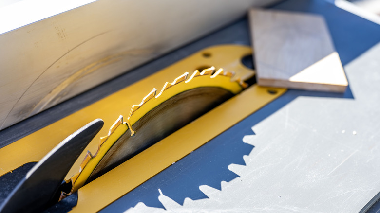Yellow rimmed saw blade in the sunlight