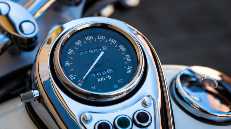 Motorcycle gauge displaying mileage