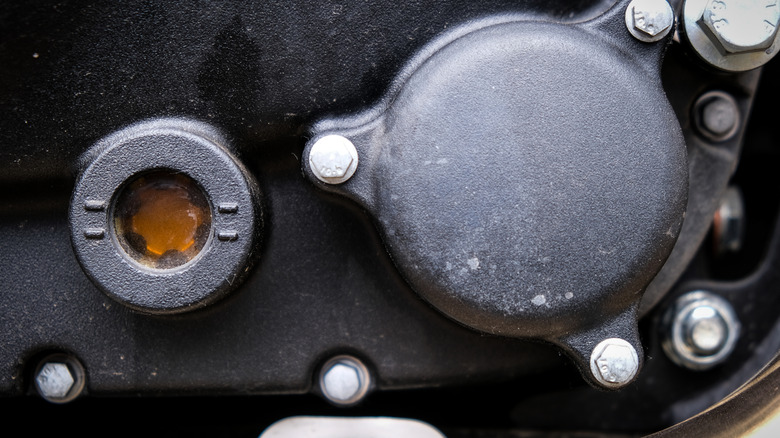 Motorcycle oil sight glass window