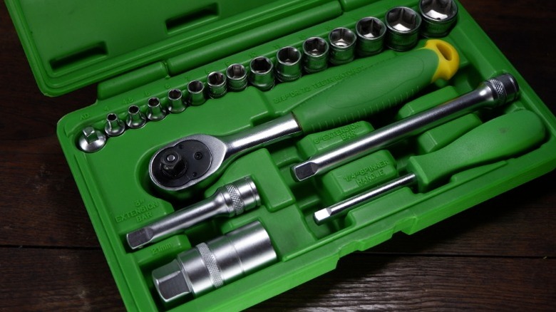 A green ratchet and socket set