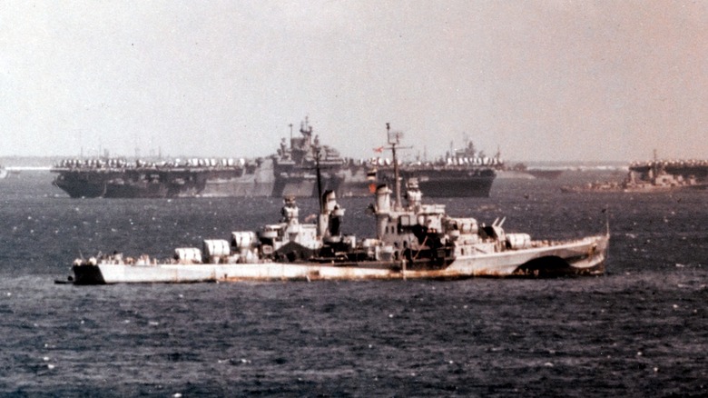The USS Flint and two Essex-class aircraft carriers in 1945