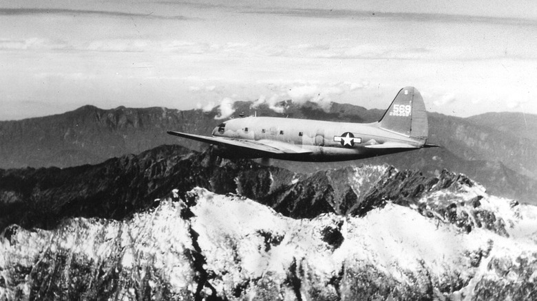 US Army Air Force cargo plane flying over the Himalayas in World War 2