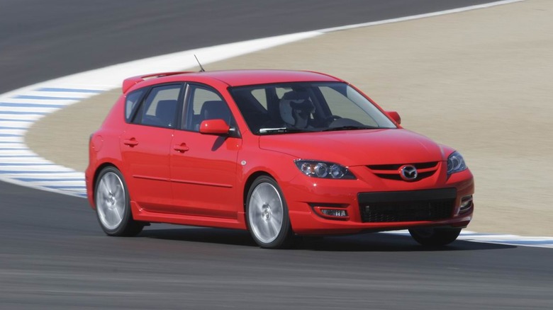 Red Mazdaspeed3 on race track