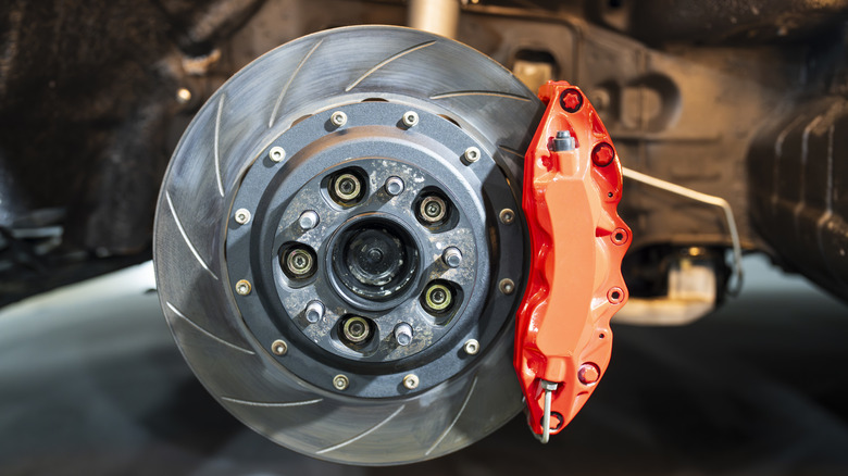 Grooved disc brake with red calliper