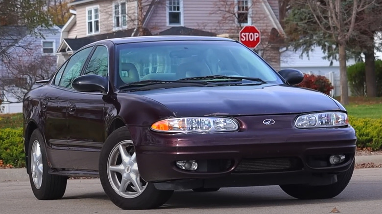 A 2004 Oldsmobile Alero GLS Final 500 parked in a residential area
