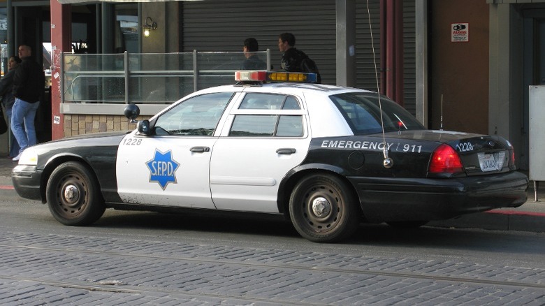Black and white police Crown Victoria