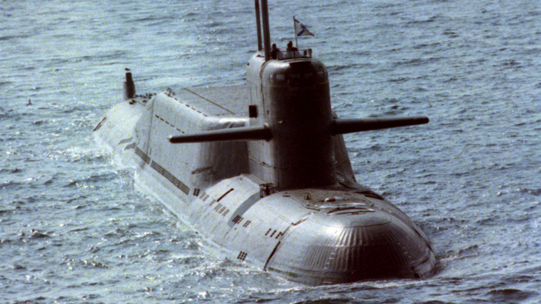 A Delta-II Class nuclear submarine half submerged on ocean