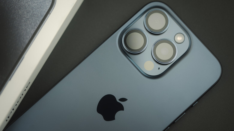 triple lens on the back of iPhone 15