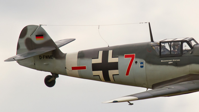 Rear view of a German fighter plane with cable visible