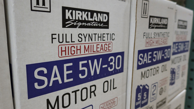 Boxes of Kirkland Signature Full-Synthetic High Mileage SAE 5W-30 oil, variable-focus image