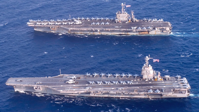 The Gerald R. Ford (CVN-78, bottom) alongside USS Harry S. Truman (CVN-75, top)