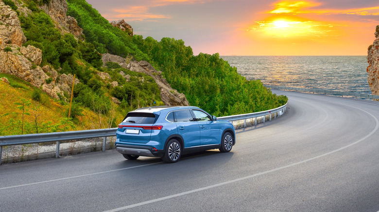Car driving on scenic road