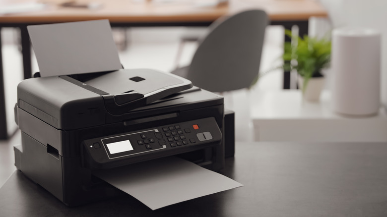 lonely fax machine on desk