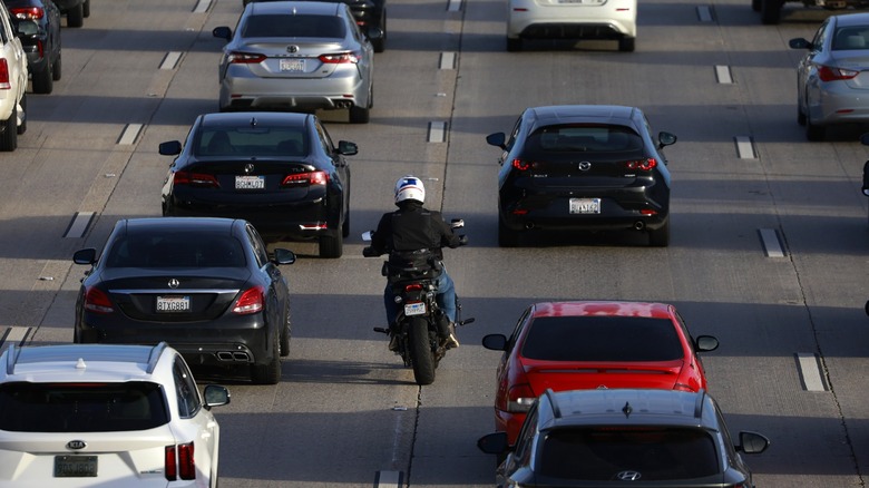 person lane-splitting