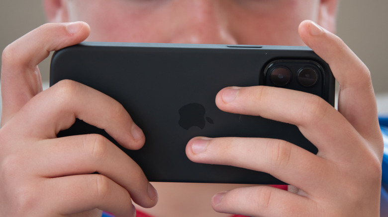 A person using a phone.