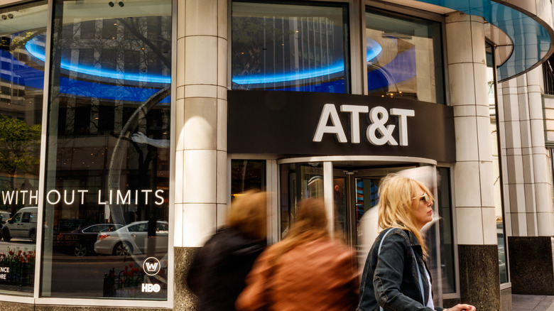 People outside an AT&T building