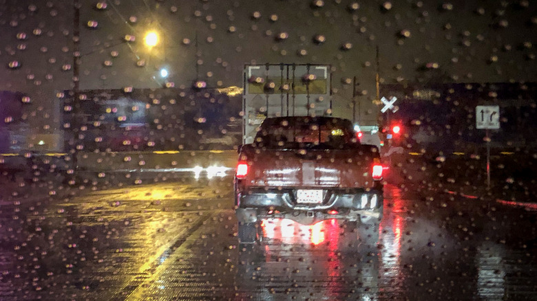 A Pickup Truck Stopped In A Rainstorm