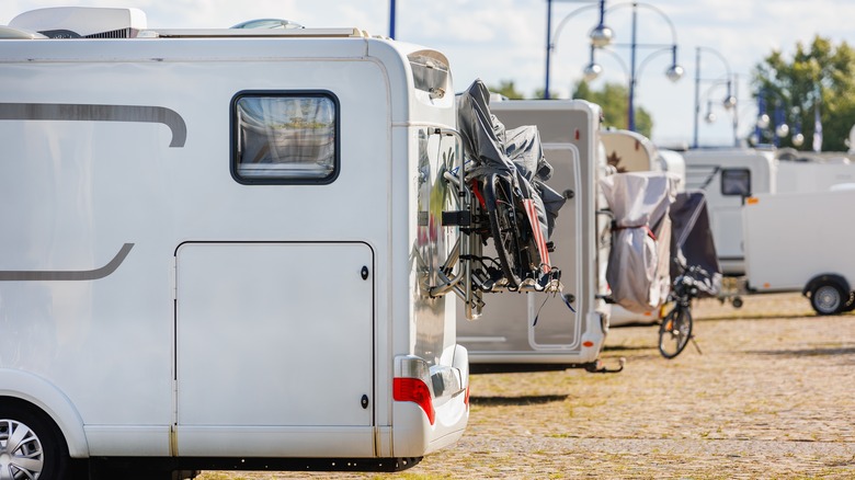 White RVs parked in a row
