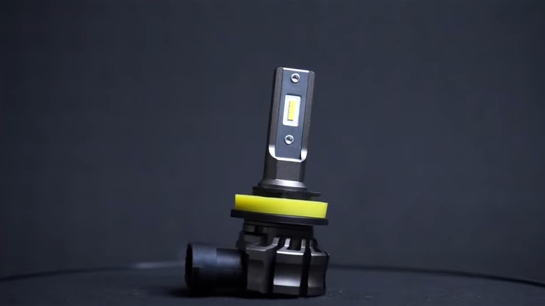 LED Headlight Part Against Dark Background