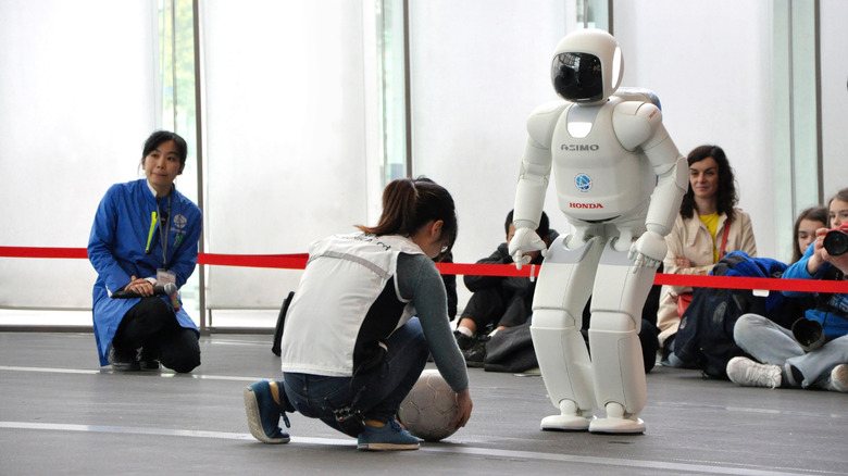 asimo playing soccer