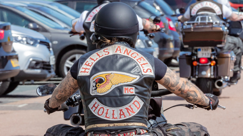 Rear View of Male Hells Angel Motorcyclist Riding his Bike