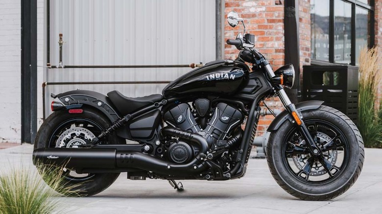 Indian Scout Sixty Bobber parked on cement driveway