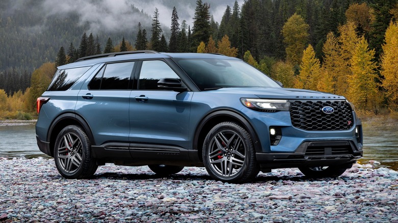 2025 Ford Explorer ST parked on pebbles near water
