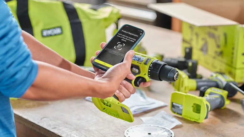 Man completing Ryobi's product registration process