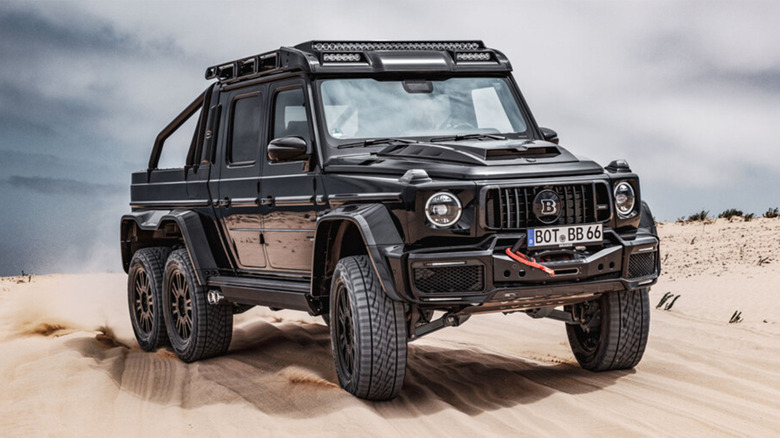 Black Barbus 6x6 off-roading sand dunes