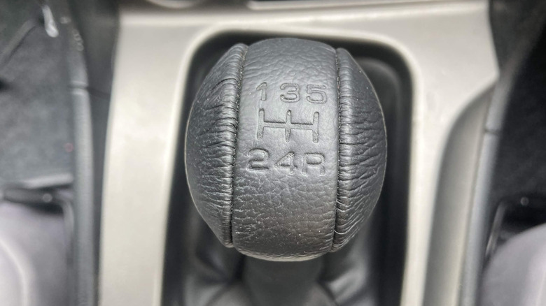 Close-up of shifter knob of 5-speed manual transmission