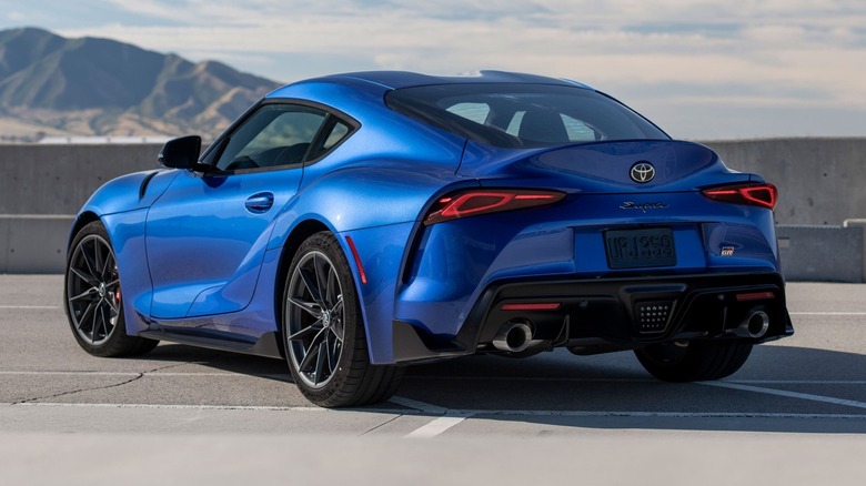 Stratosphere 2026 GR Supra Premium parked with a a concrete barrier and mountains in the background