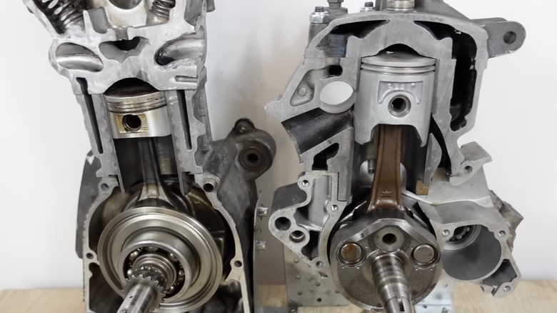 A pair of single cylinder engines, one 2-stroke and one 4-stroke