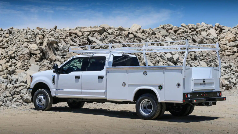 A modified Ford F-series pickup with a utility bed
