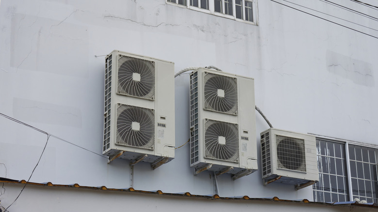 Air conditioning units on a wall.