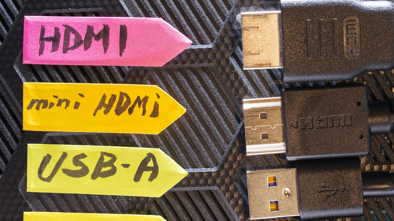 A standard HDMI, mini HDMI, and USB-A cable all togetether.