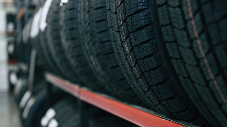 New tires on rack in store