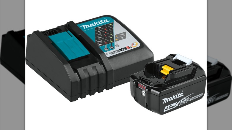 Makita 18V 4 Ah battery and charger on a white background