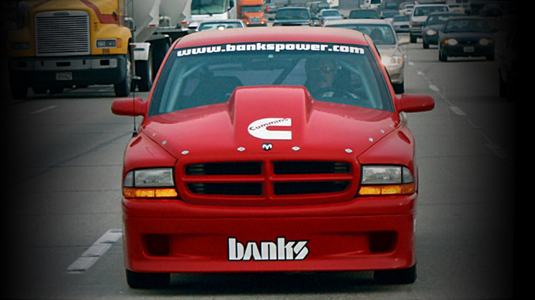 Front shot of a modified Dodge Dakota in traffic