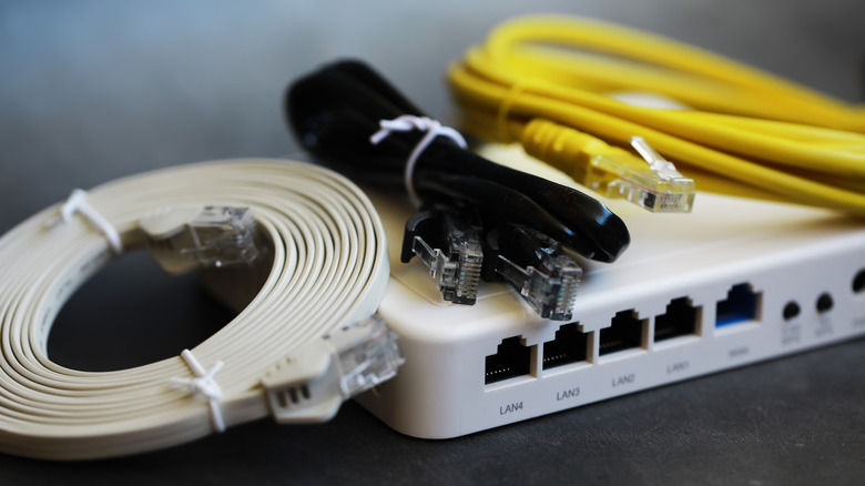 Home internet router with three different Ethernet cable types