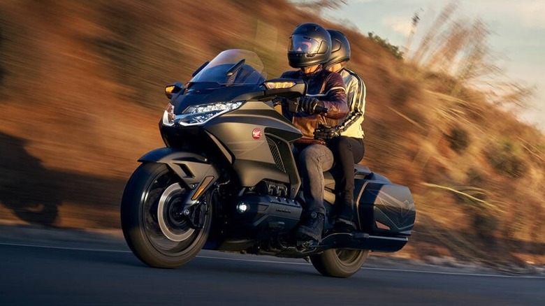 Rider and passenger cruising on the 2025 Honda Gold Wing